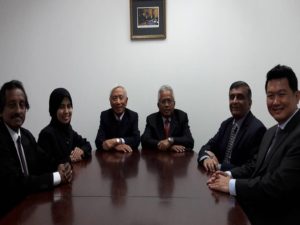 Team seated around the conference table